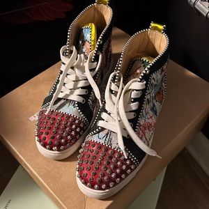 Christian Louboutin sz 41 studded graphic high tops. Gently loved -worn 2xs.